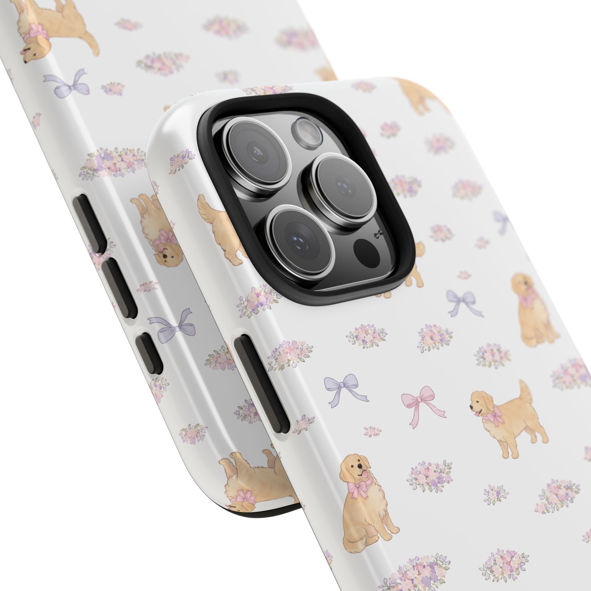 Phone case close-up: golden retriever icons and bows around triple camera cutout