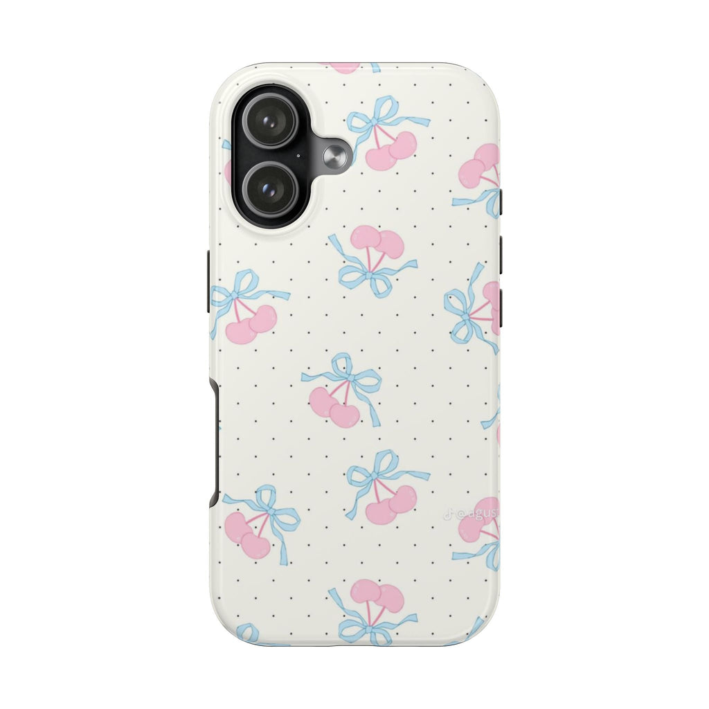 White phone case with pink cherries, blue bows, and tiny black polka dots pattern