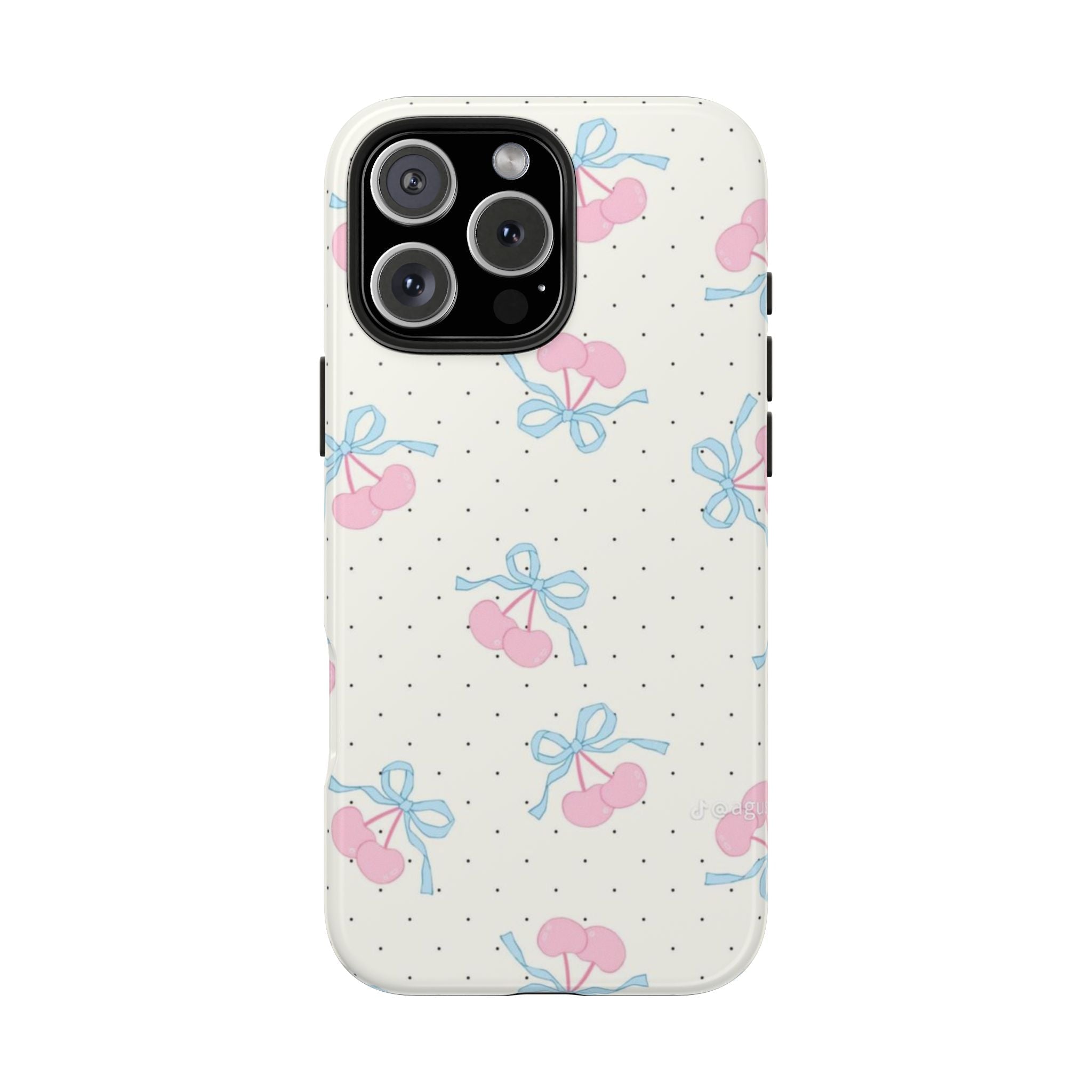 White phone case with pink cherry-and-blue-bow pattern and black polka dots, camera cutout