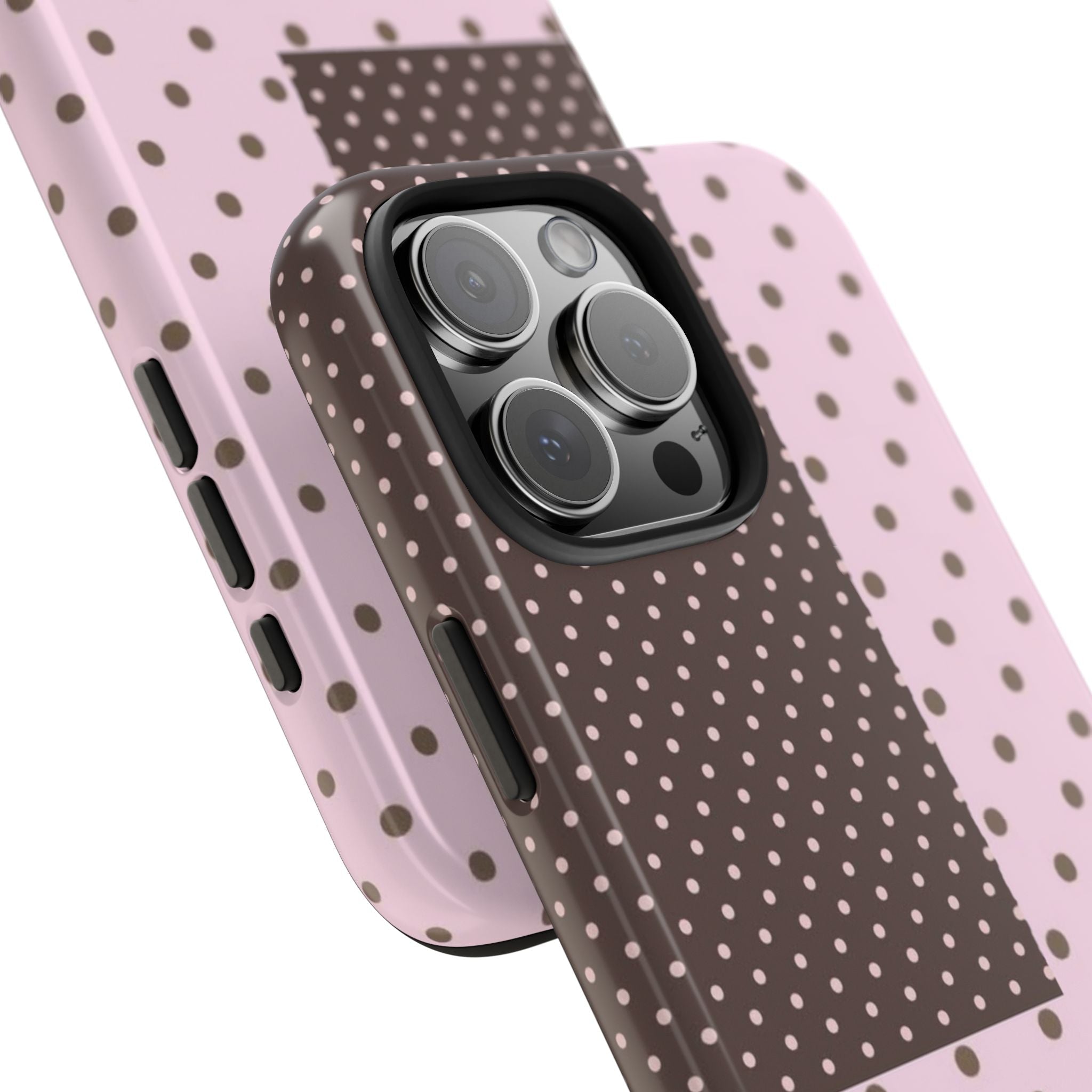 Close-up lilac polka dot phone case showing raised camera lenses and side buttons