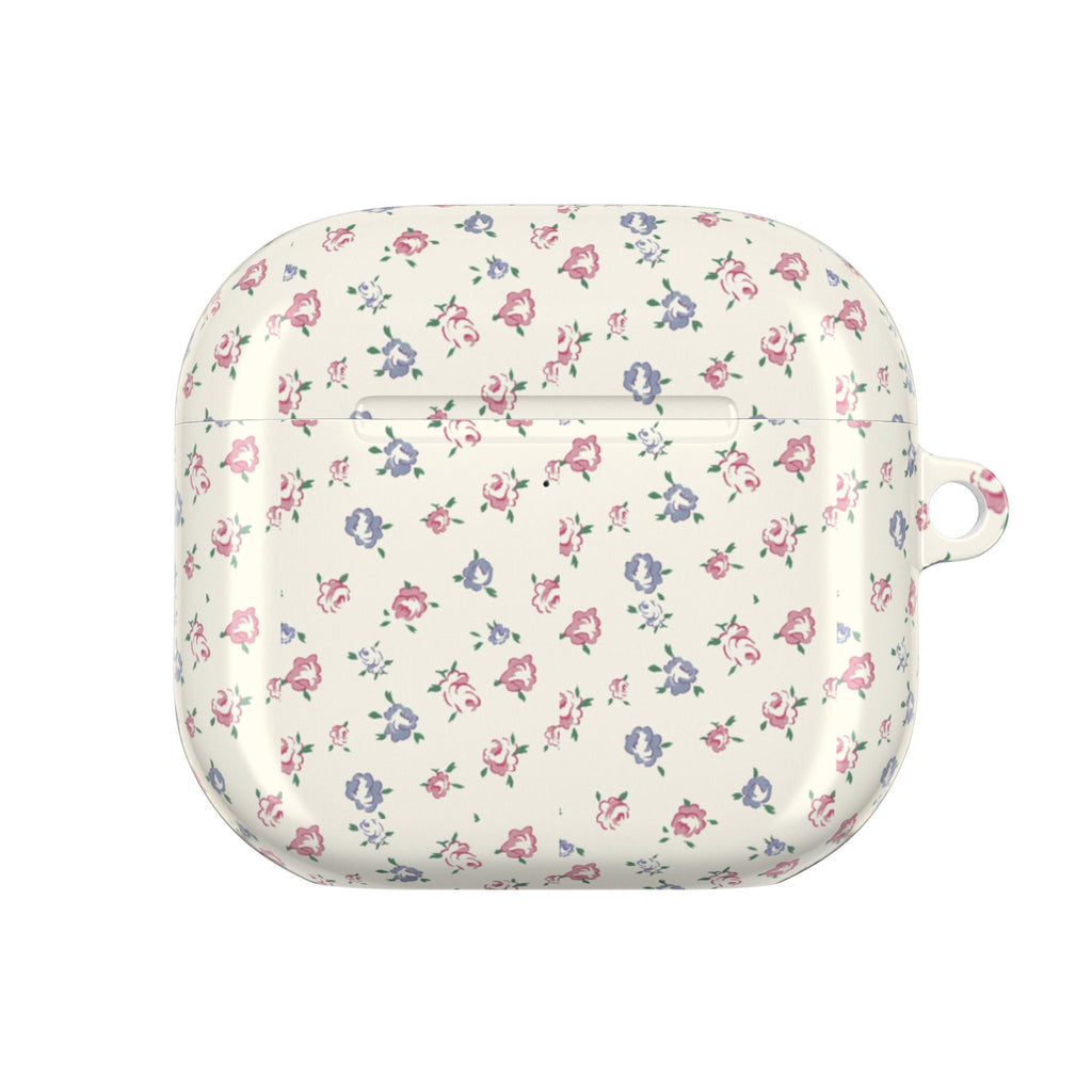 Floral AirPods case side view with small earbud loop; cream with pink and blue blooms