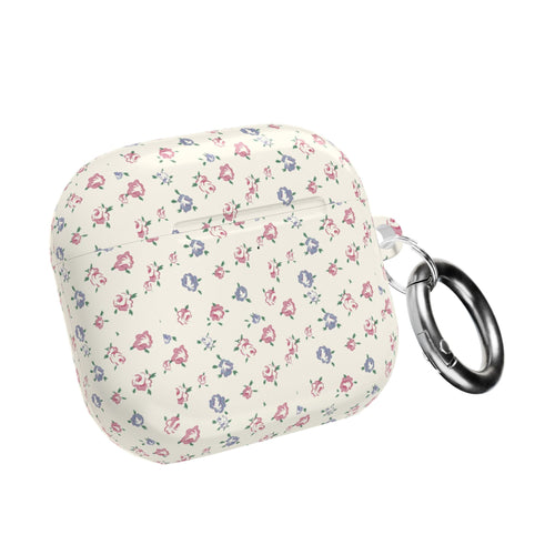 Floral AirPods case closed with metal key ring; cream with small pink and blue flowers