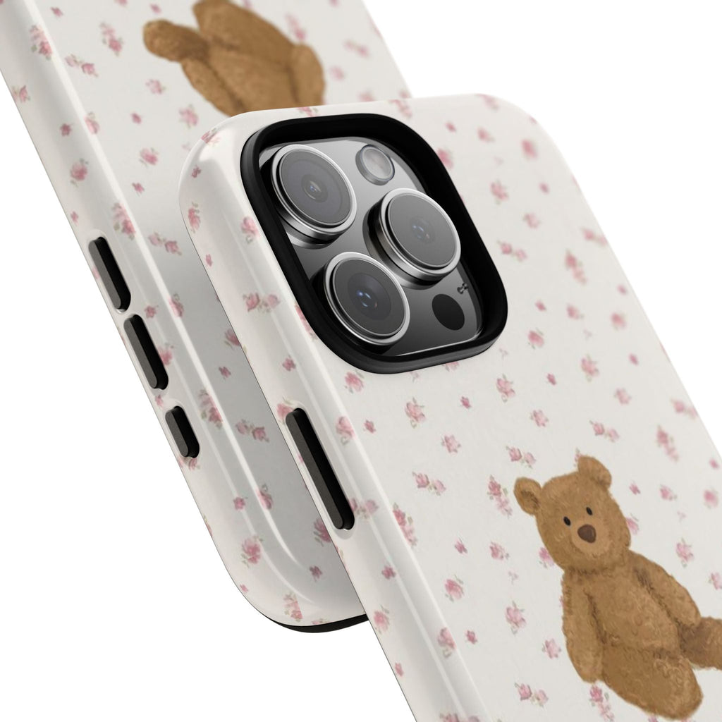 Angled view of cottage ditsy floral teddy bear phone case with side cutouts