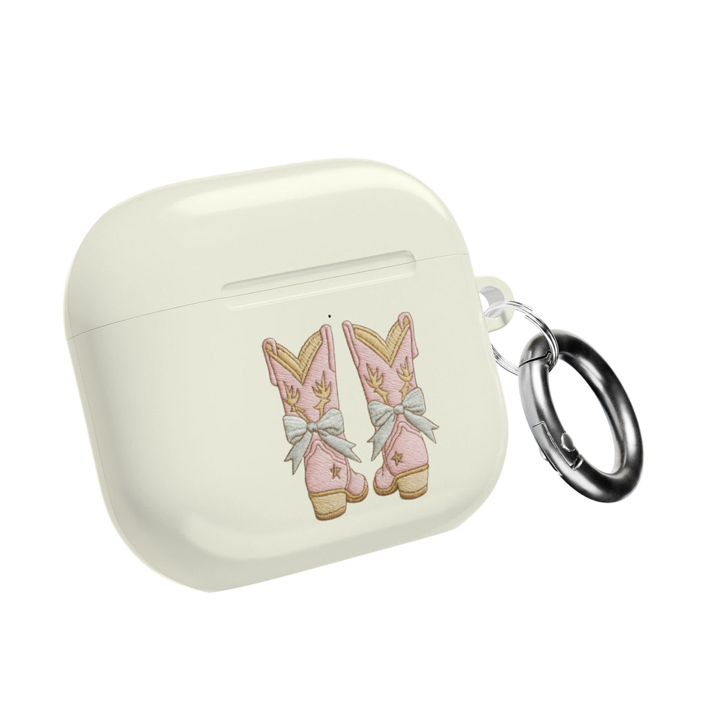 Light cream AirPod case with cowboy boot bow graphic and metal keyring