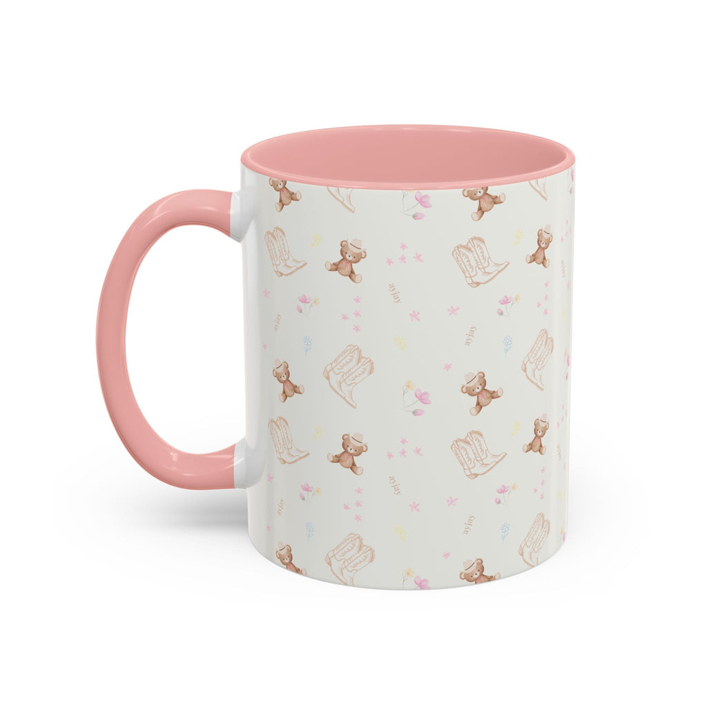 Ceramic cowgirl teddy mug, white with pink rim and handle, patterned with teddy bears and boots
