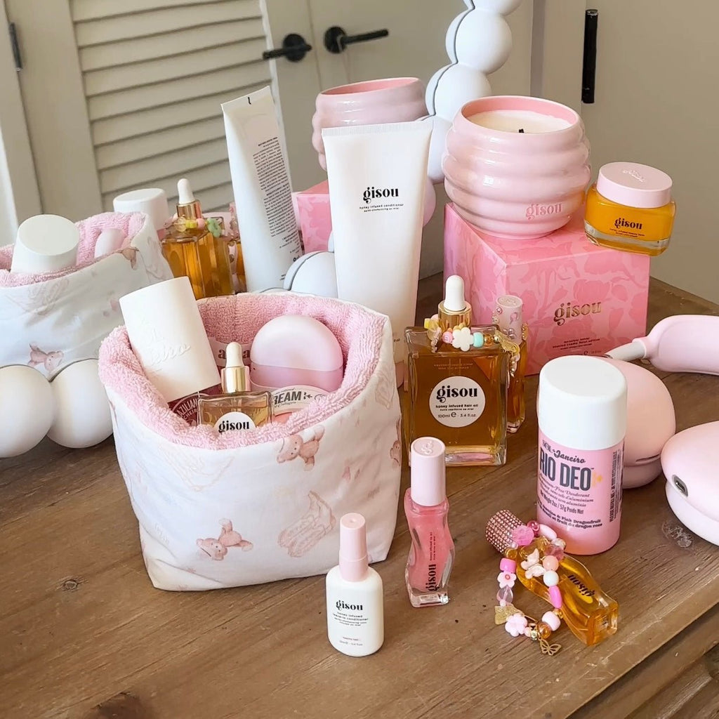 Teddy bear boots organizer with pink bear print fabric, holds bottles on tabletop