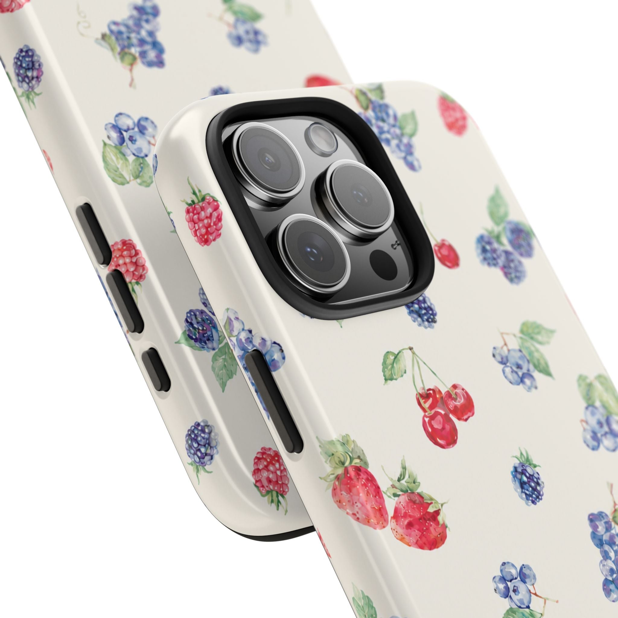 Side view of cream phone case with blue and red berries and leaf print