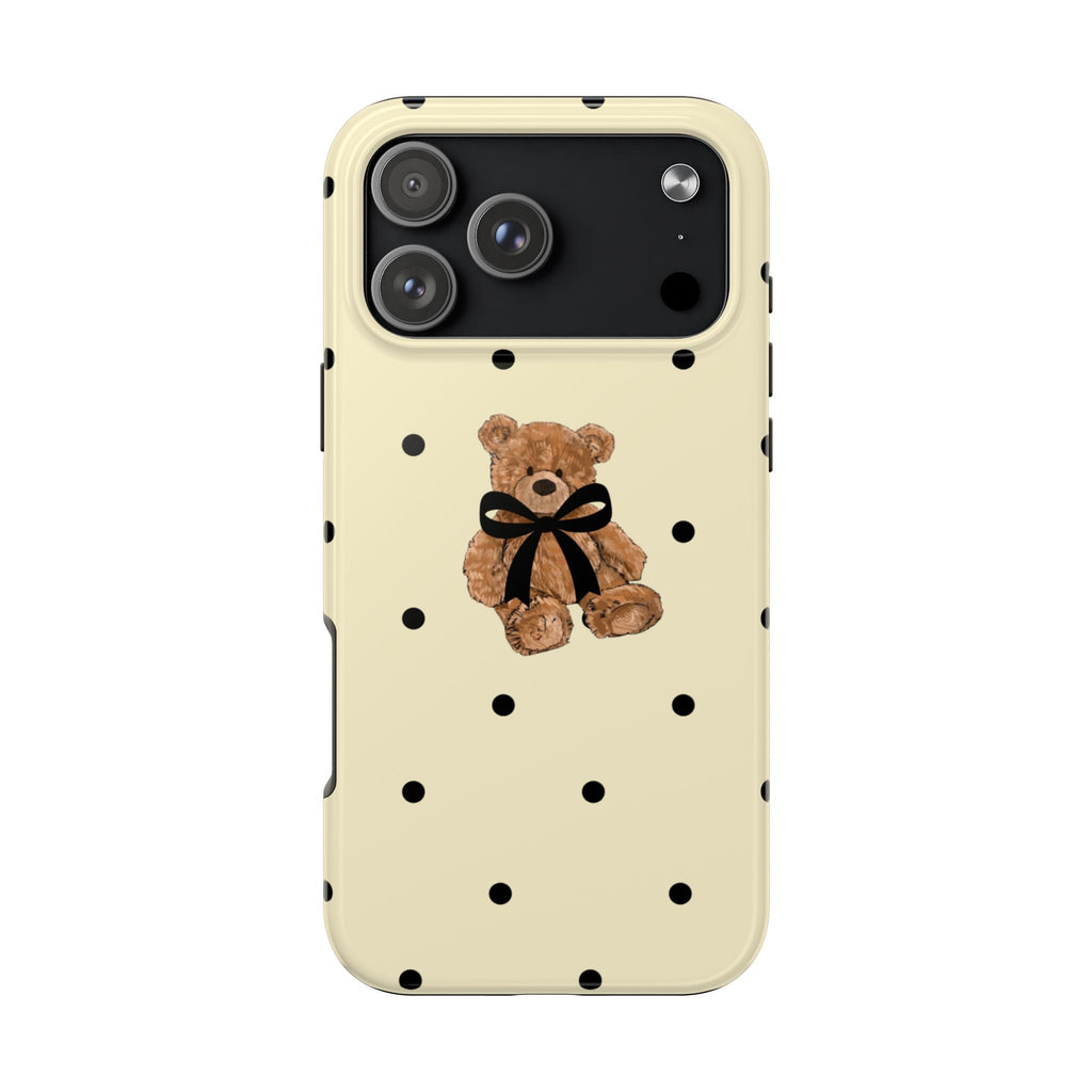 Cream phone case with black polka dots and teddy bear bow on back