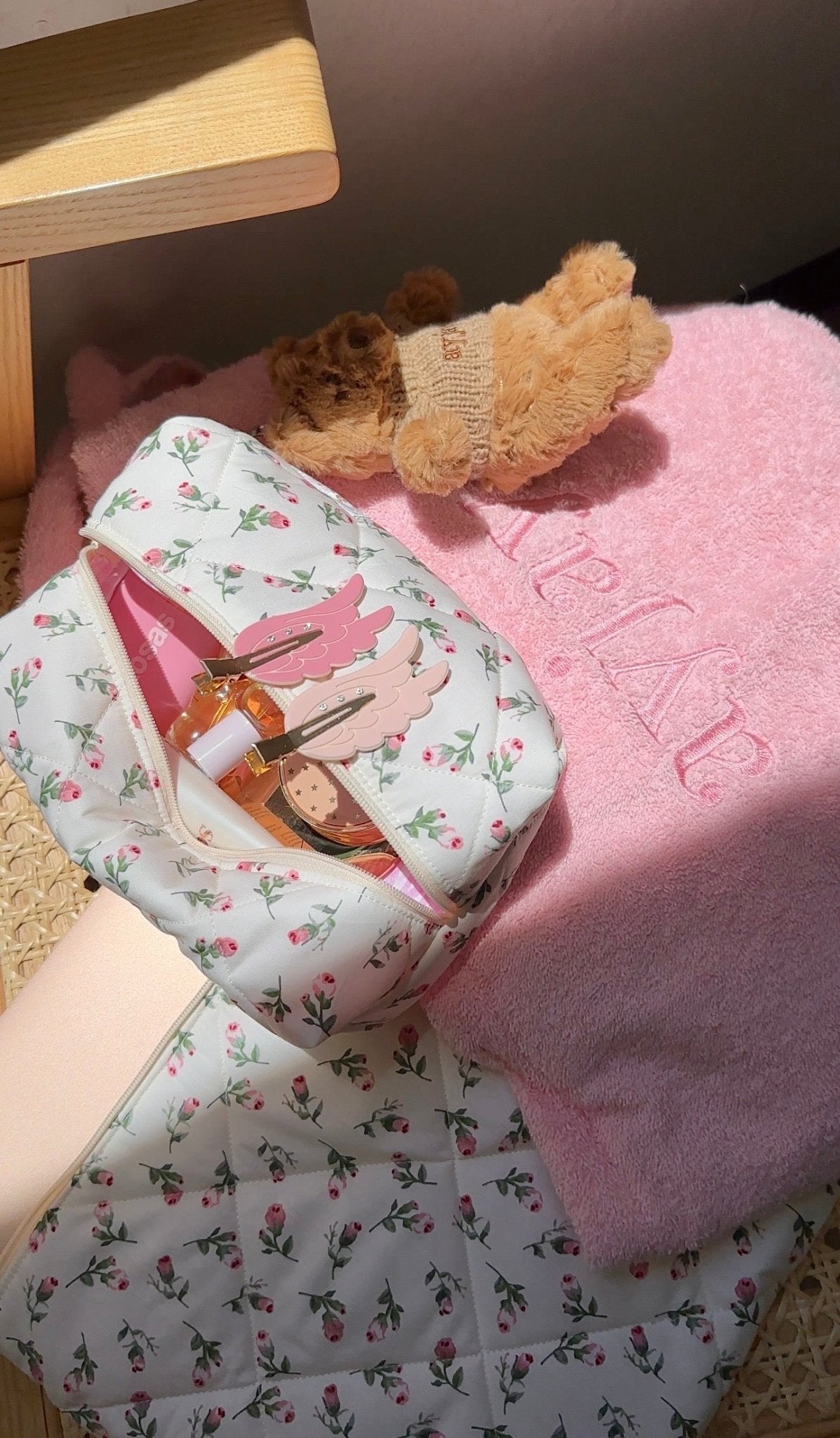 Cream baby dress with pink floral bird print and front zipper detail