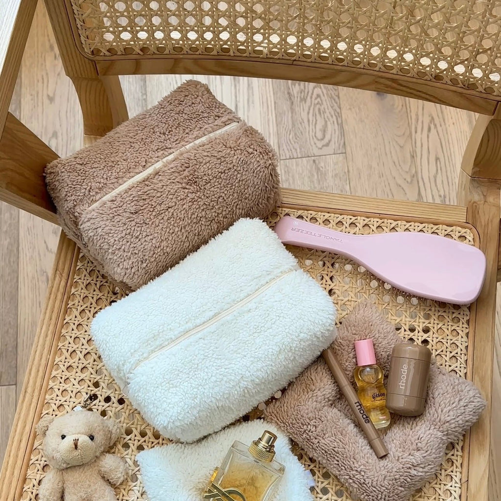 Camel and white teddy zip pouch set with smooth pink accessory, stacked inside a tray.