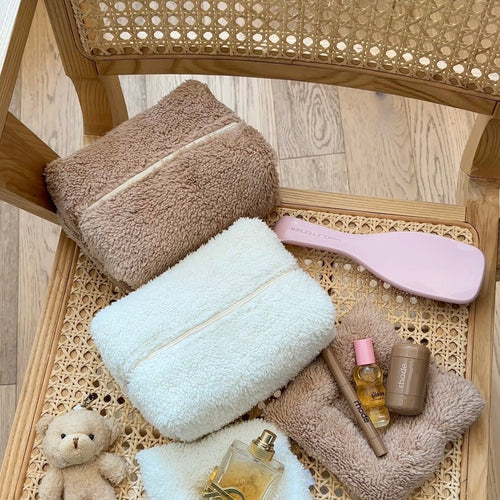 Camel and white teddy zip pouch set with smooth pink accessory, stacked inside a tray.
