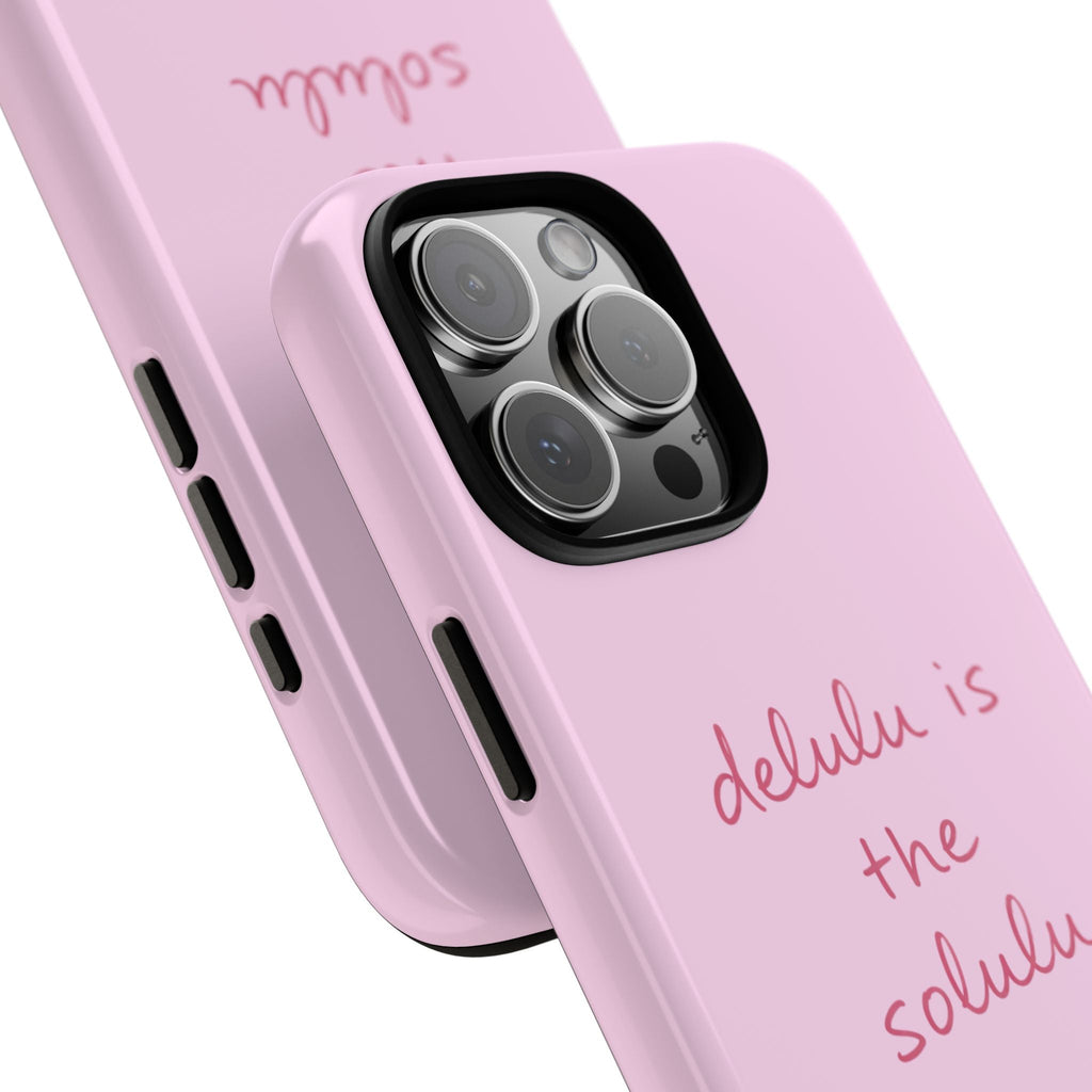 Light pink phone case side buttons and 'delulu is the solulu' text with camera lenses