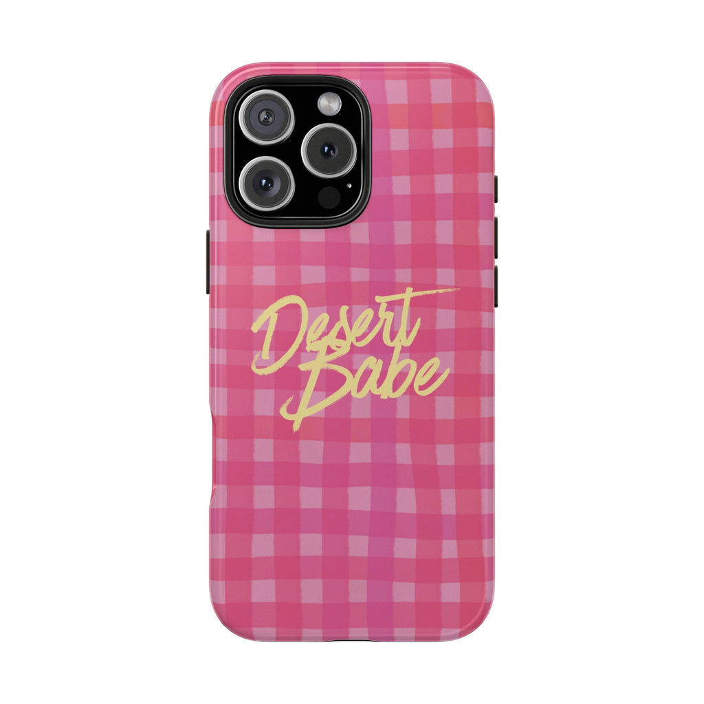 Pink gingham phone case with “Desert Babe” logo, visible camera opening