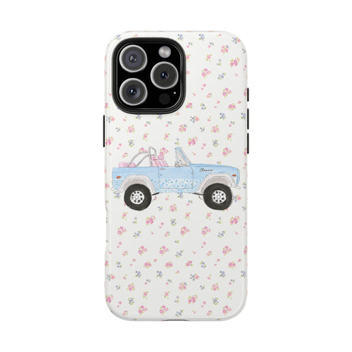 Vintage bronco phone case with ditsy floral pattern, blue truck on white background