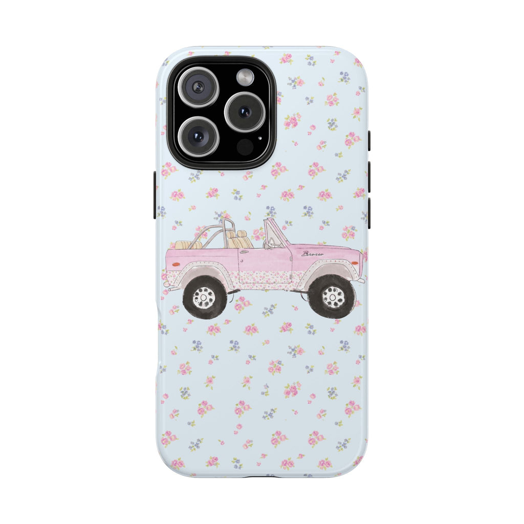 Light blue ditsy floral phone case with pink vintage Bronco truck; rear camera cutout