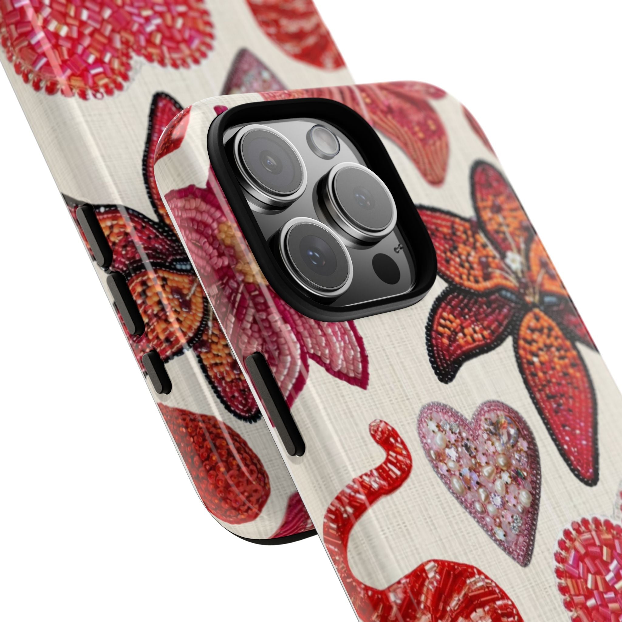 Angle view: embellished red tiger phone case with rhinestone bow and heart details.