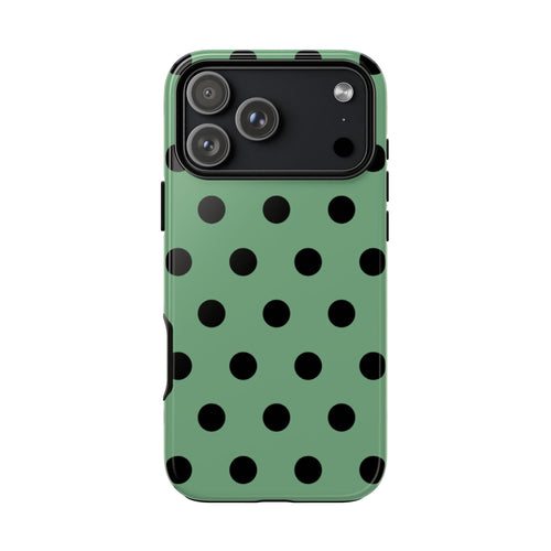 Emerald green phone case with black polka dot pattern and camera cutout