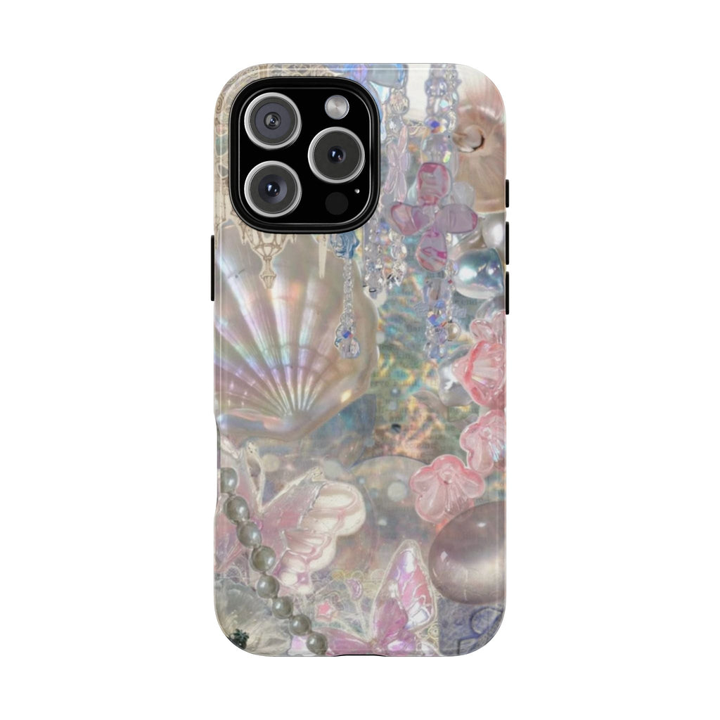 Iridescent sea shell phone case with pink, blue, and pearl details and cutout for cameras