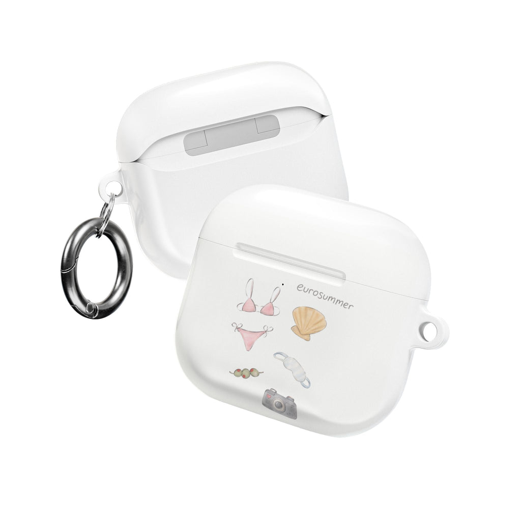 White AirPod case with beach print and metal ring, side view