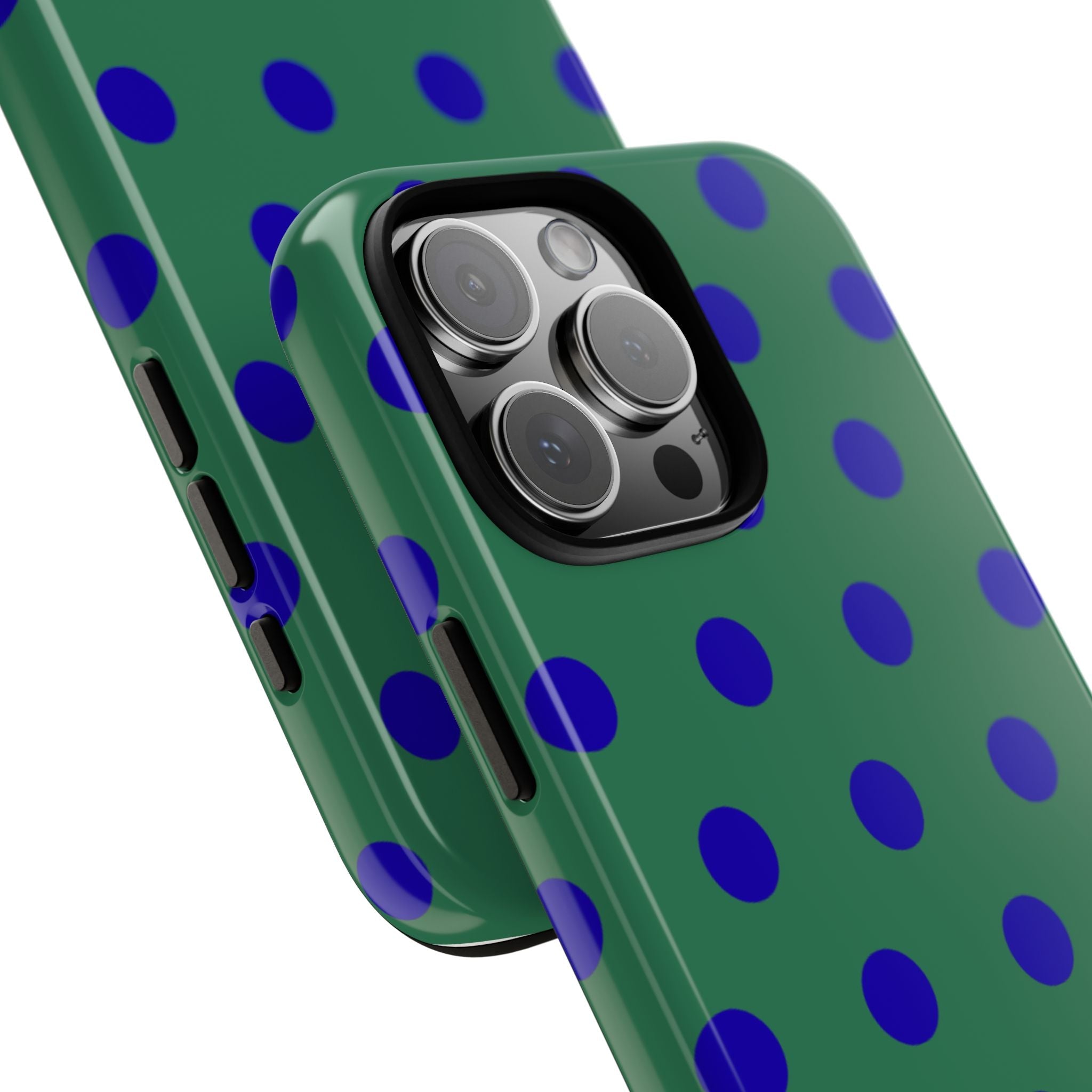 Green polka dot phone case showing camera lenses and cutout at an angle