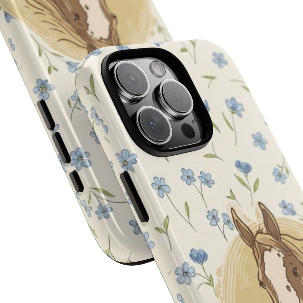 Angled floral horse phone case with blue flowers, cream base, and camera cutout