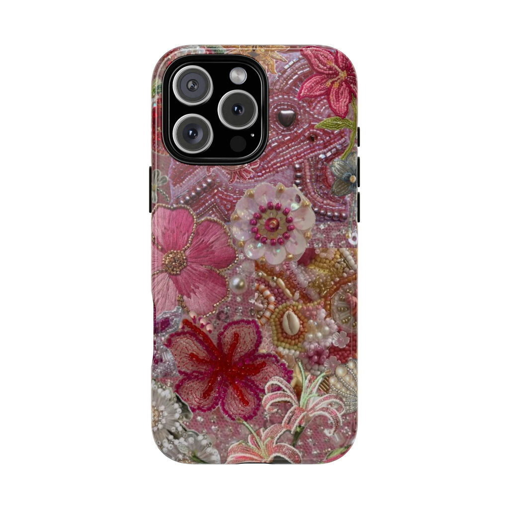 Pink floral phone case with beaded pearl embellishments and 3D flowers; camera cutouts