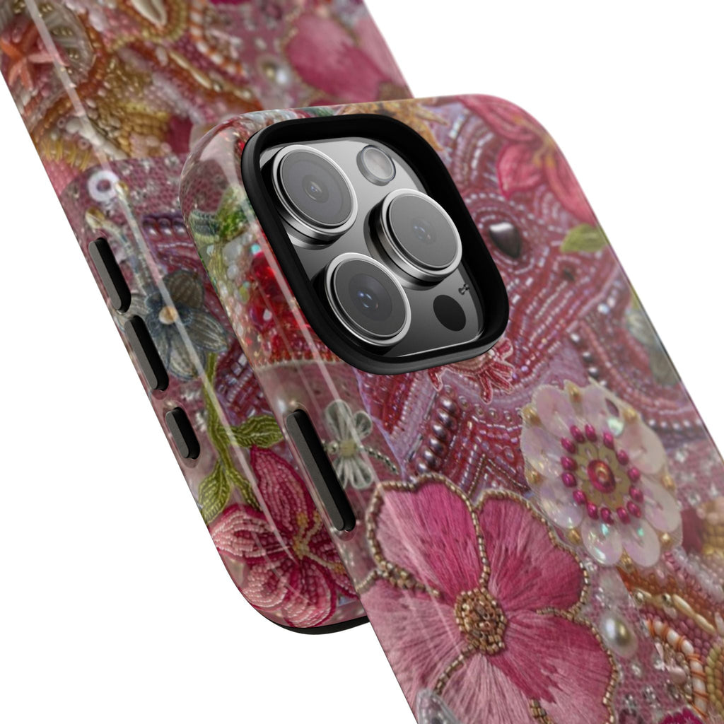 Pink floral pearl phone case with raised 3D flowers and side cutouts along the edge