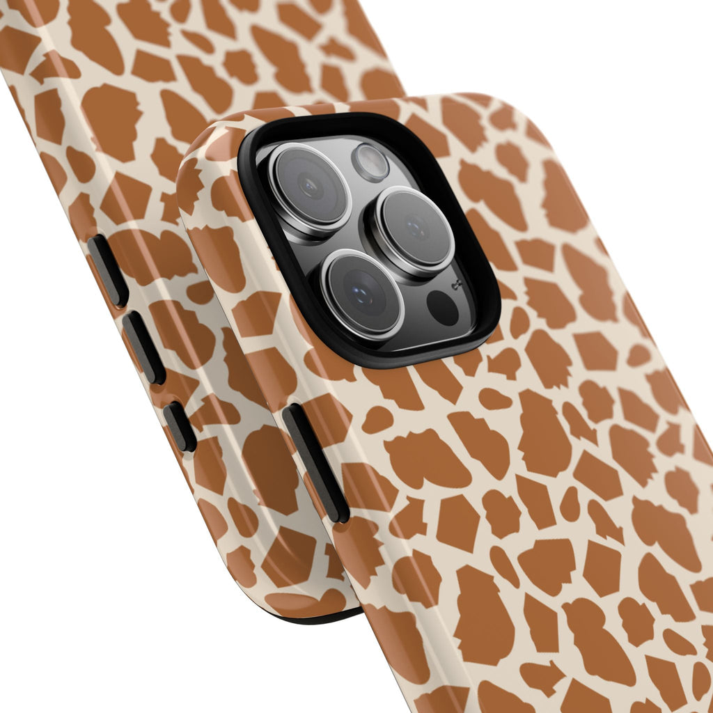 Giraffe-pattern phone case side view, brown and white print with button cutouts