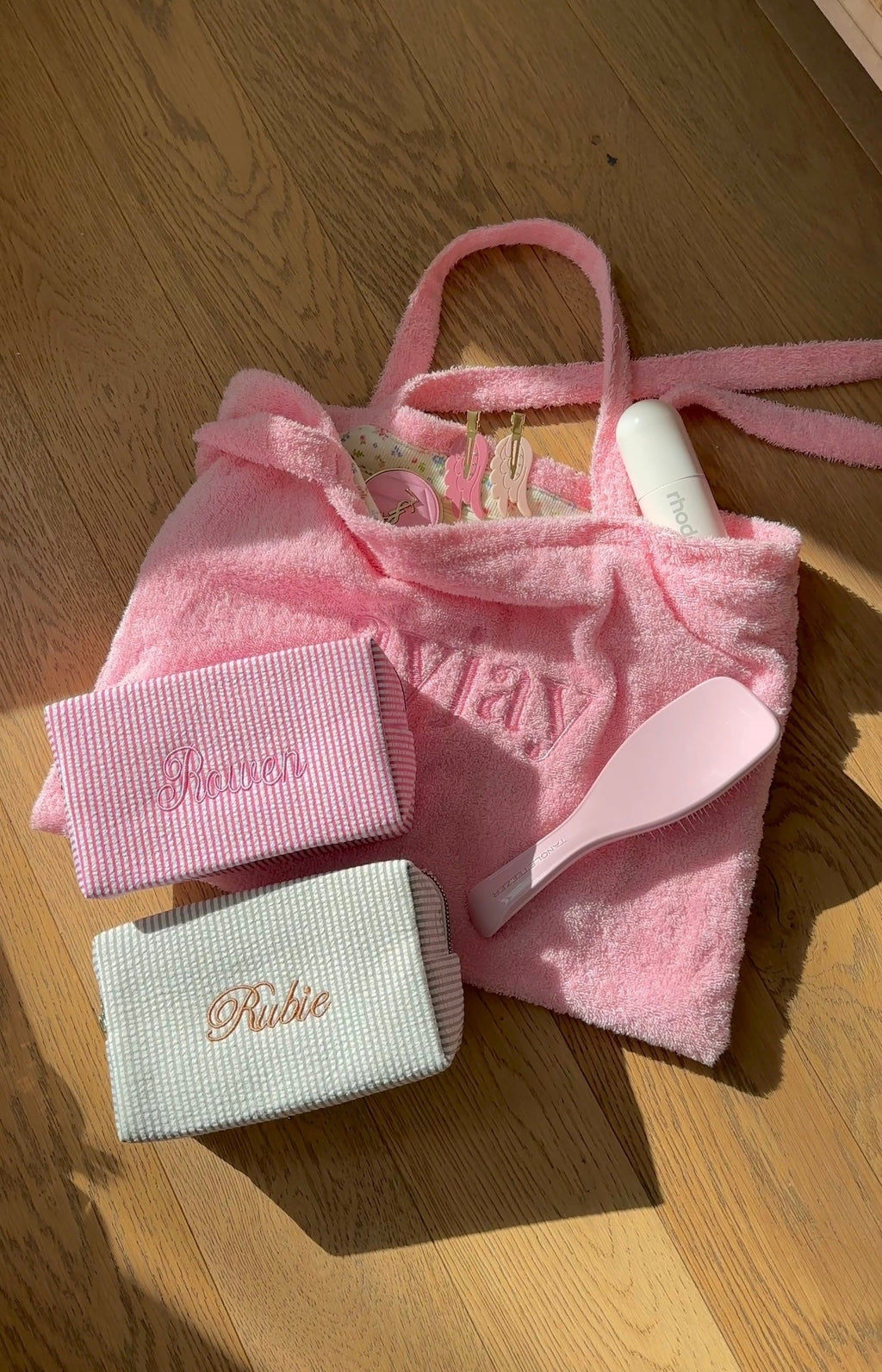 Pink striped custom embroidery bag with embroidered “Rubie” and matching small pouch