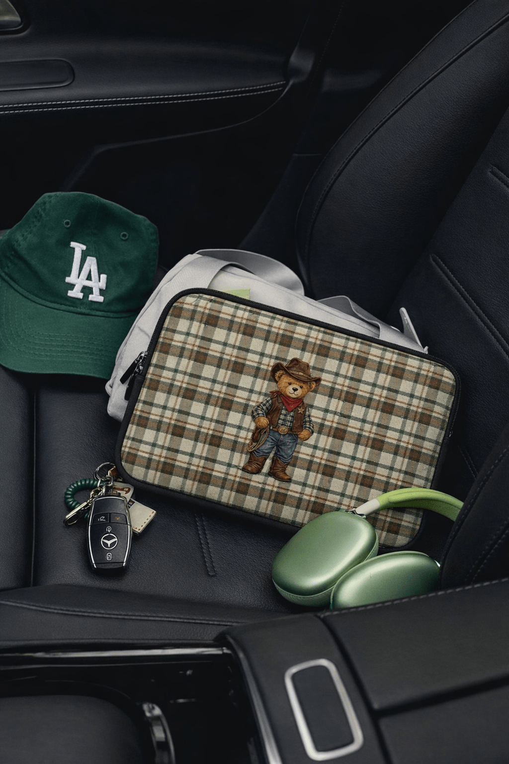 Green plaid neoprene sleeve with cowboy teddy bear patch, full-zip top