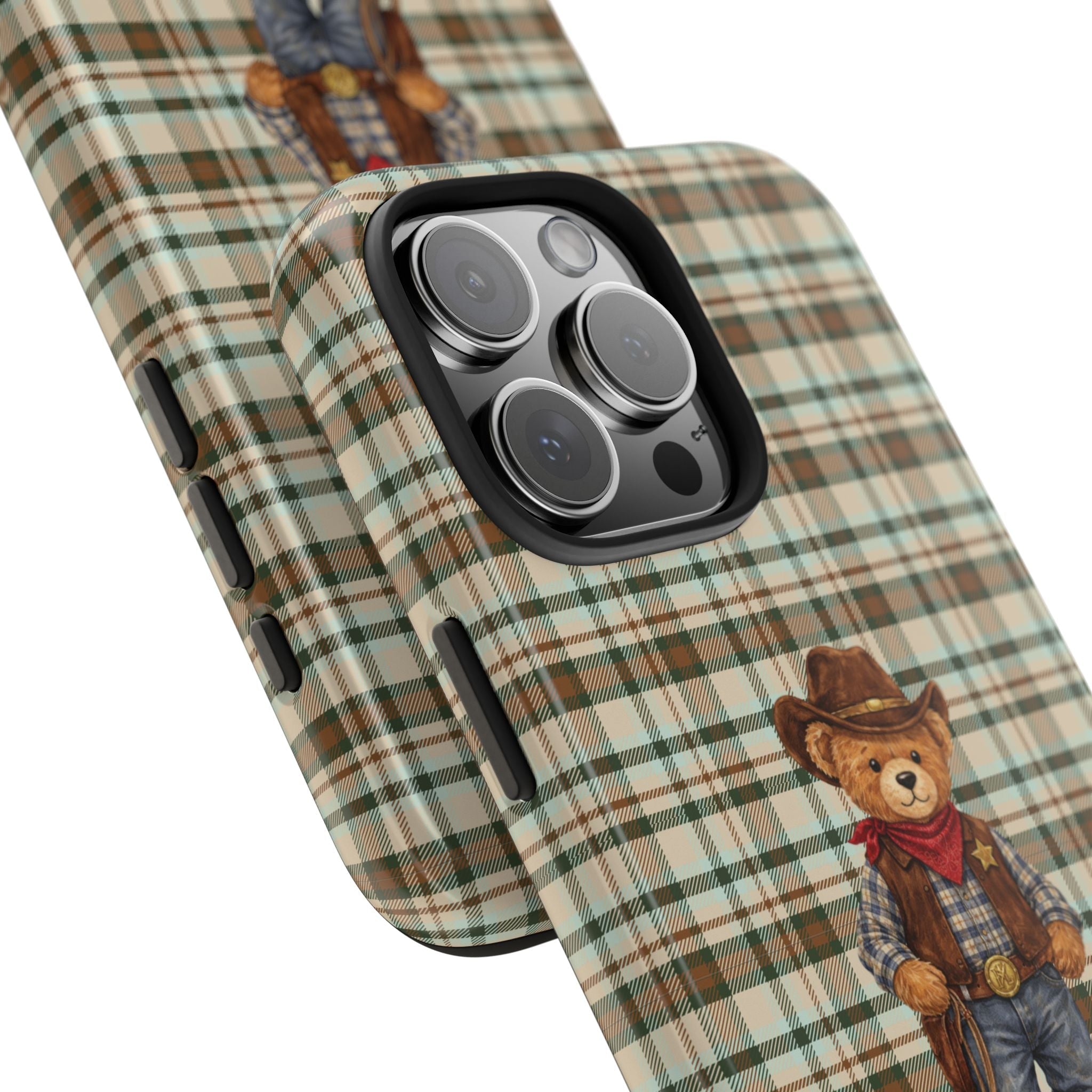 Green plaid phone case angle view with cowboy teddy bear, lens covers, and side button cutouts