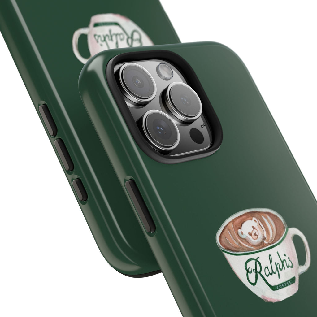 Green phone case angled view with camera lenses and Ralphi’s coffee bear mug graphic