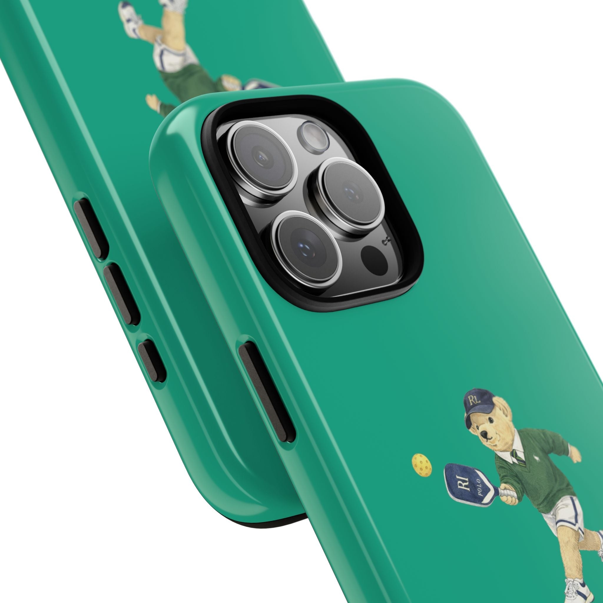 Green phone case close-up with teddy bear pickleball design and camera lens cutouts