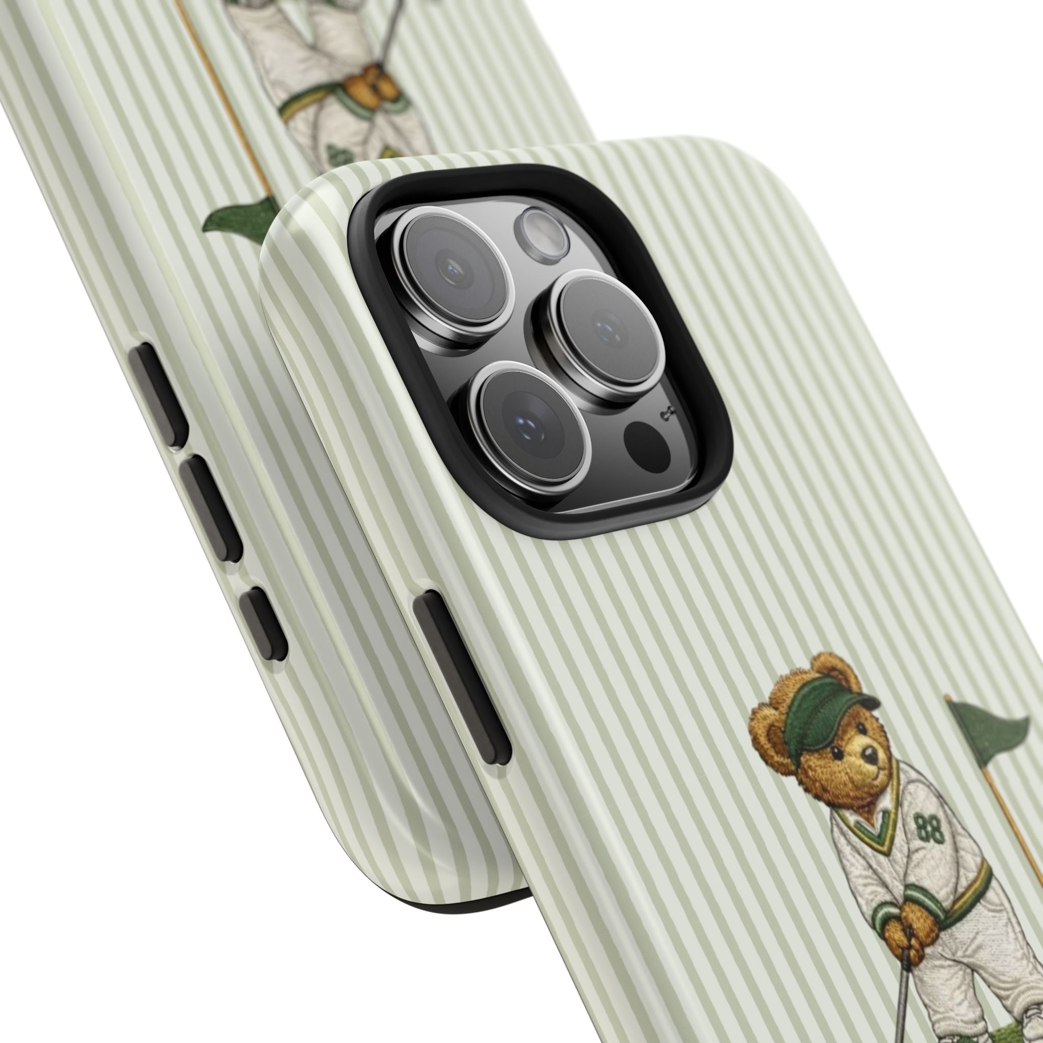 Angled view: green-and-white striped phone case with bear golfer near camera cutout