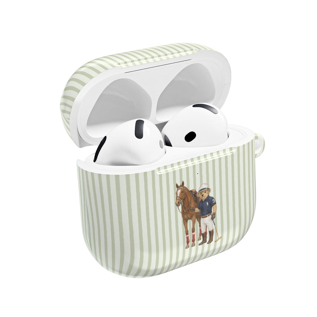Green striped AirPods case with horse-and-rider teddy bear print, open lid