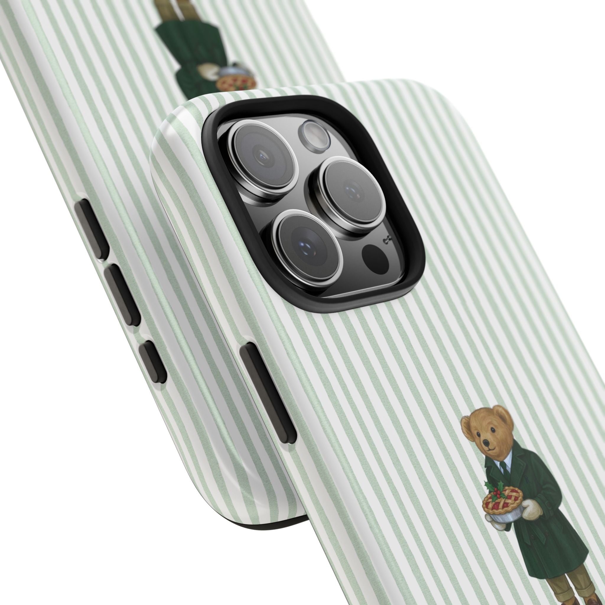 Green striped case with teddy bear in suit near camera cutout, side view