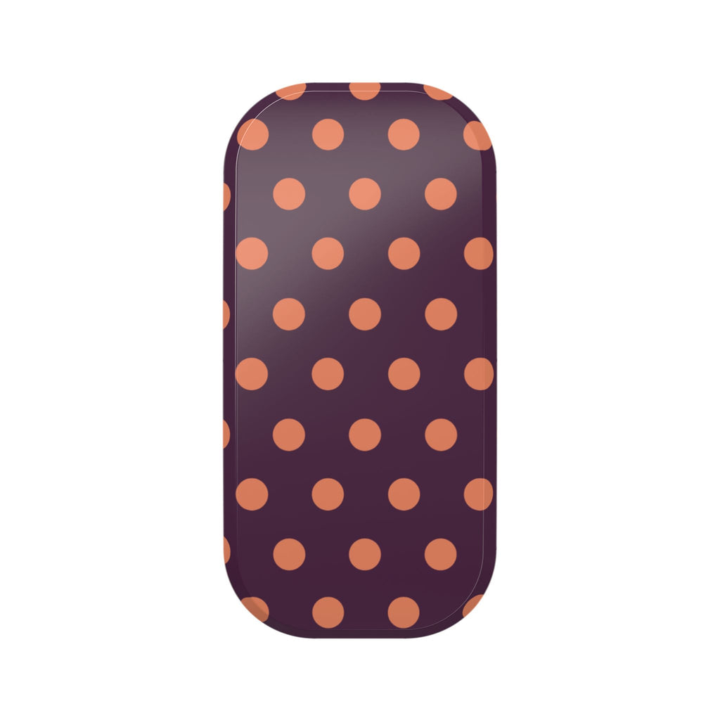 Aubergine phone grip with orange polka dot pattern