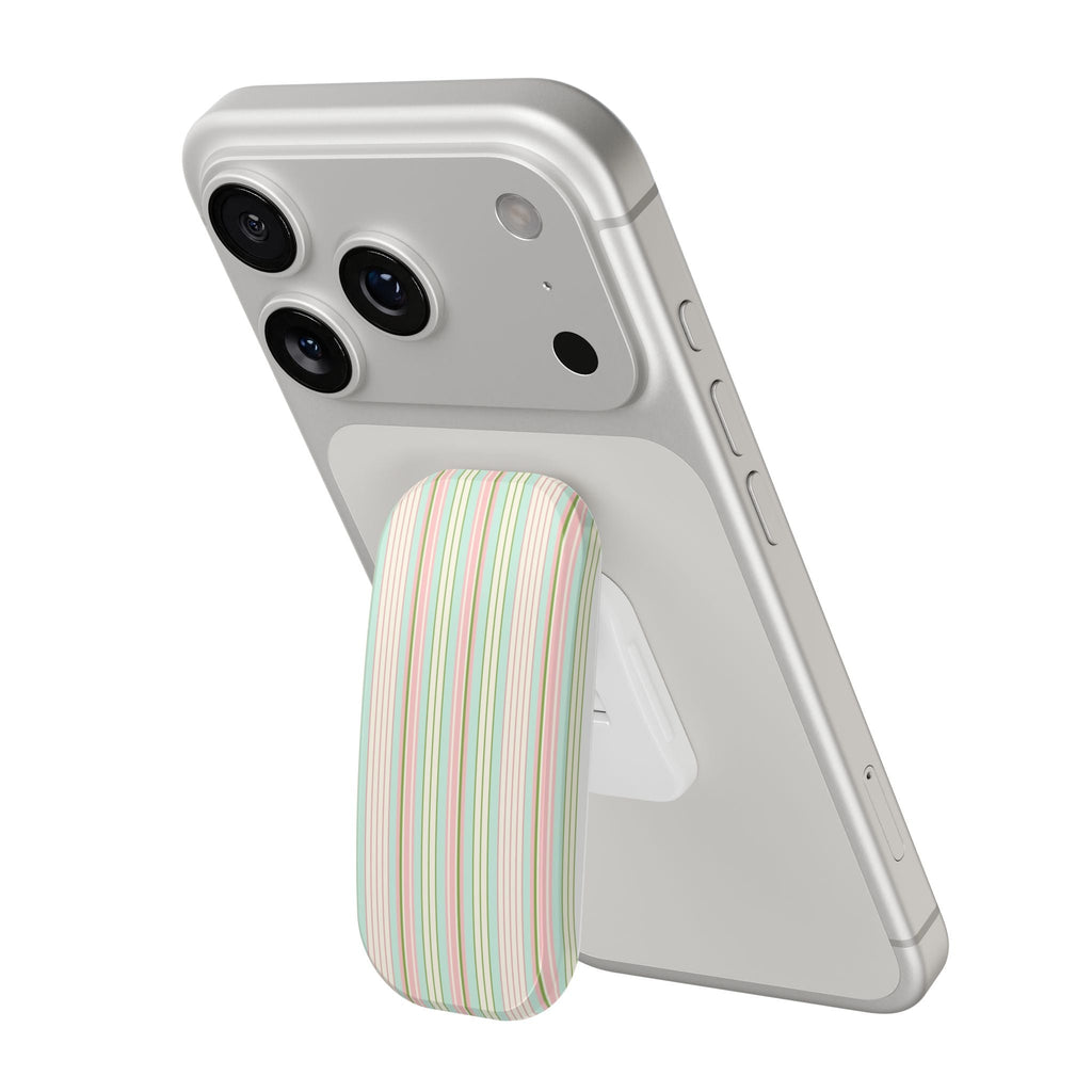 Pastel cabana striped phone grip attached to a phone case, vertical stripes, rounded.