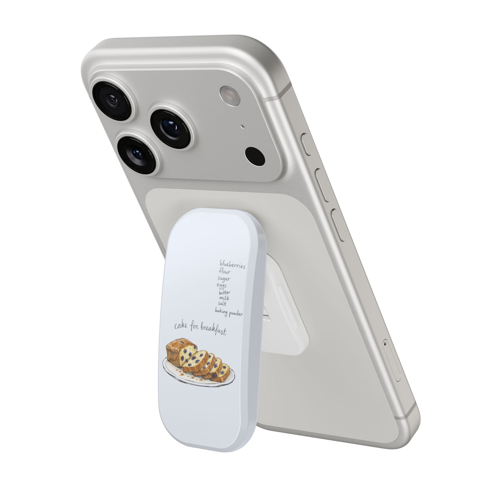 Cake for breakfast hands-free phone grip attached to light gray phone case, front view