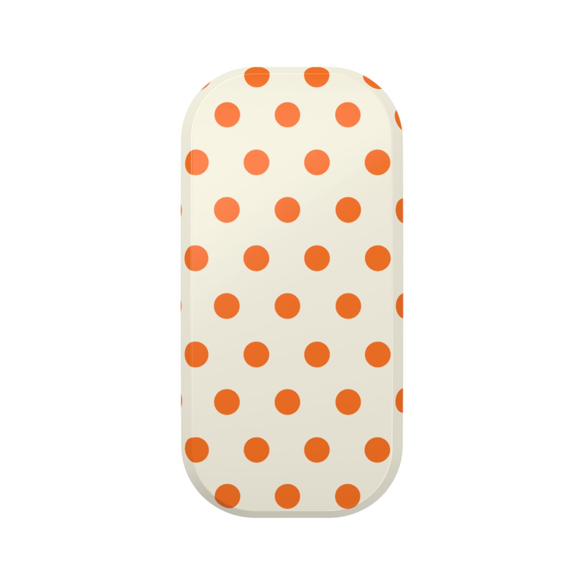 Cream phone case with orange polka-dot grip panel, rounded edge protection