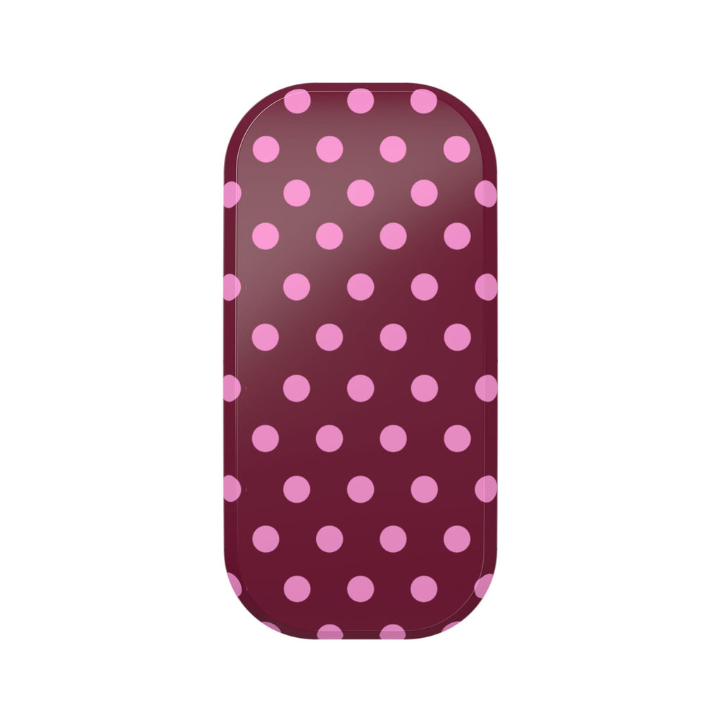 Phone grip sleeve with raspberry polka dots, rounded shape