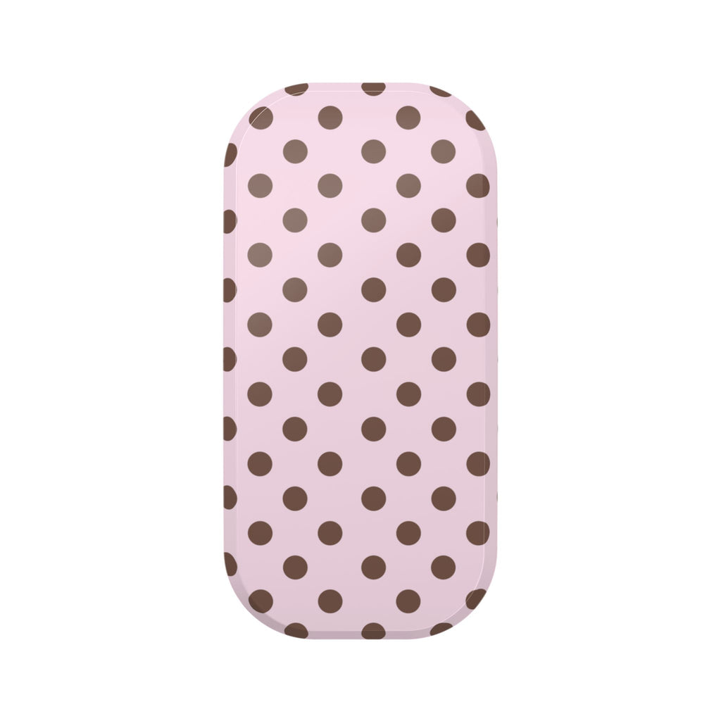 Pink polka-dot phone grip pad, oval shape with brown dots