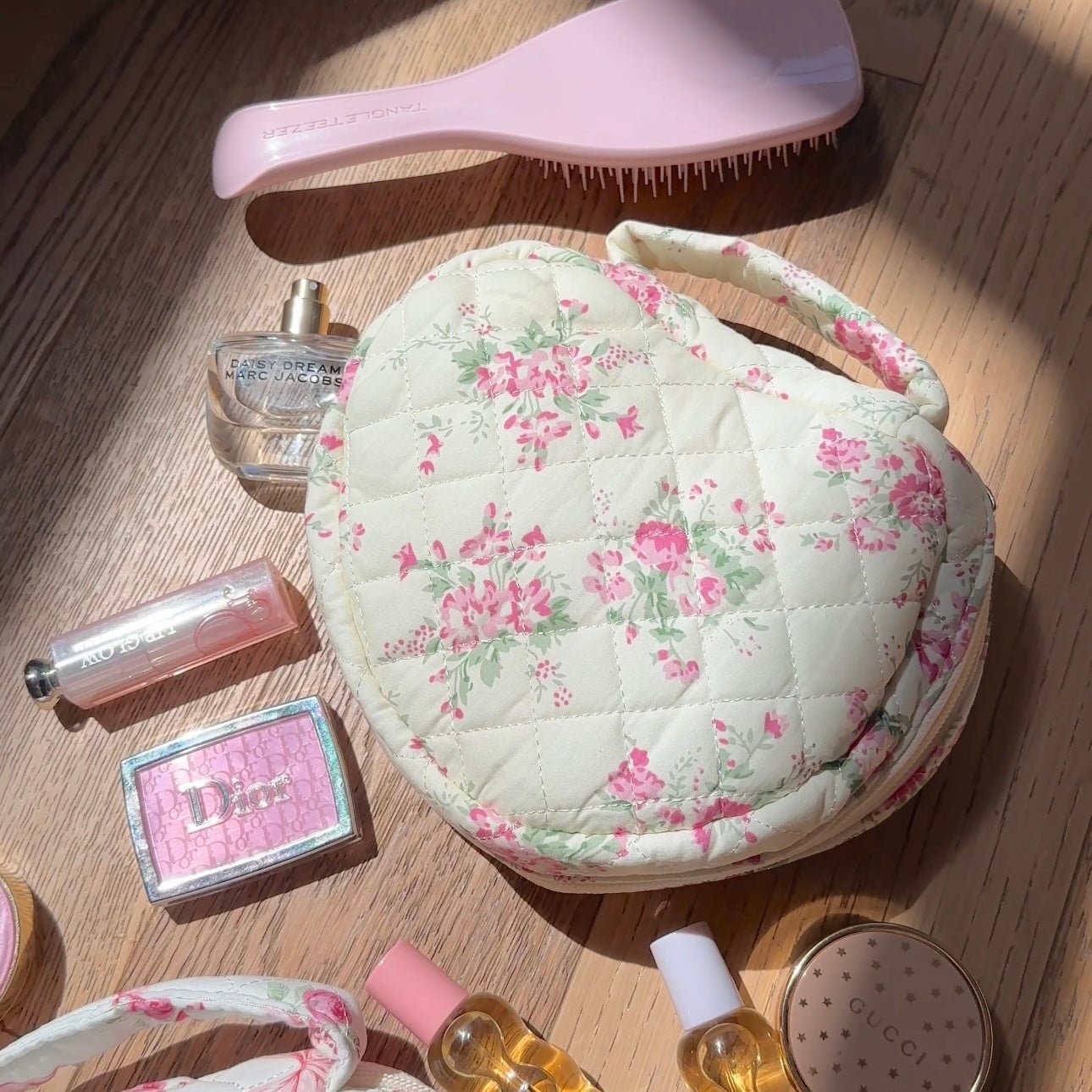 Pink floral heart quilted bag with woven bow straps and top handle
