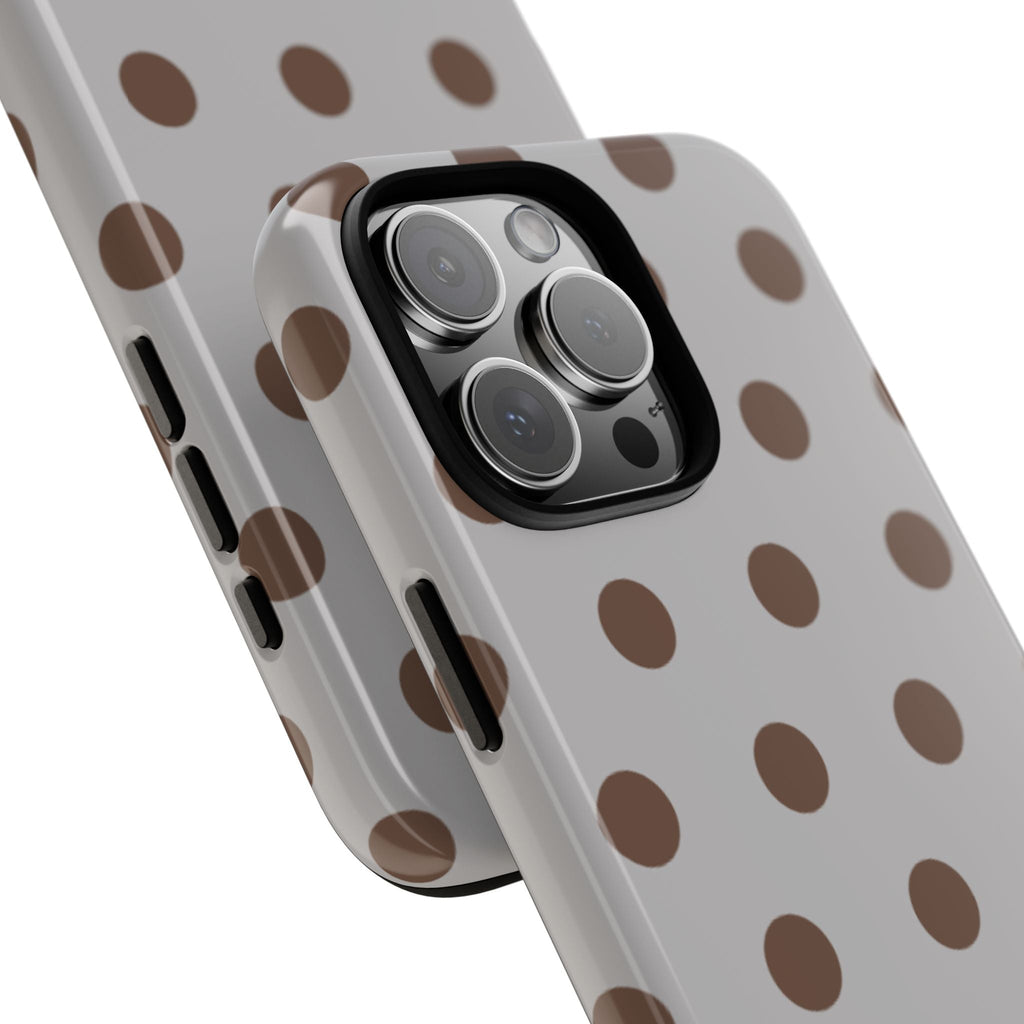 Close-up of heather gray polka dot phone case with triple camera lenses