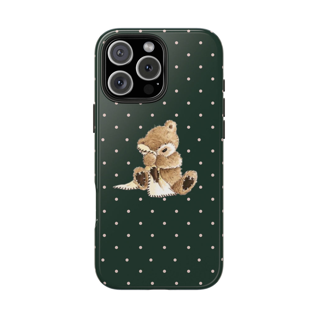Hunter green polka dot phone case with small teddy bear sitting center front