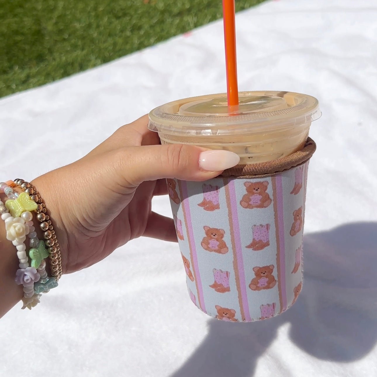 Iced coffee coozie, size S, white sleeve with pink bow teddy bear artwork