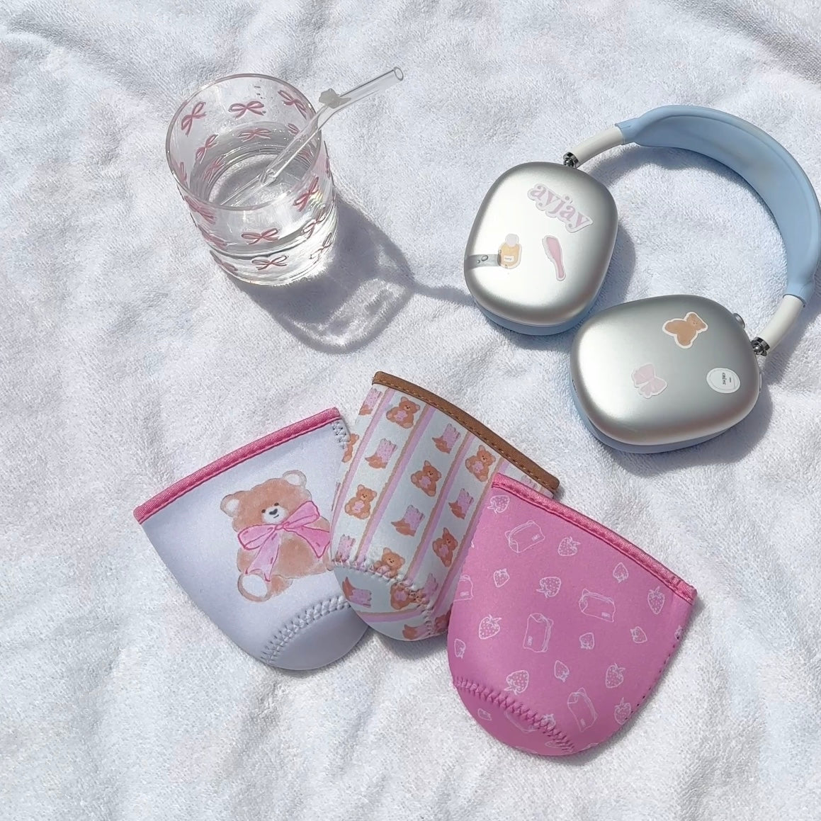 Iced coffee coozie, size S, light gray and pink with boots-and-bears pattern
