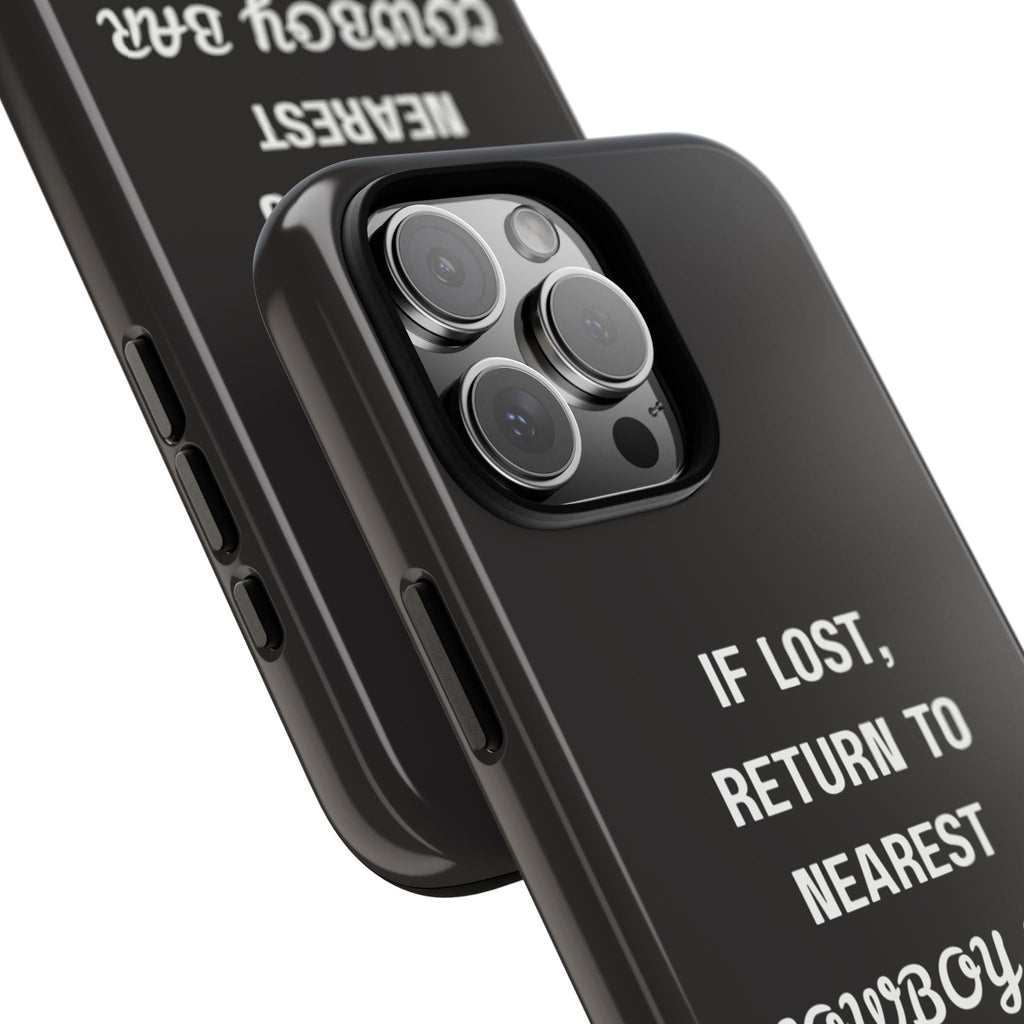 Close-up black phone case with “IF LOST, RETURN TO NEAREST Cowboy Bar” and camera cutouts
