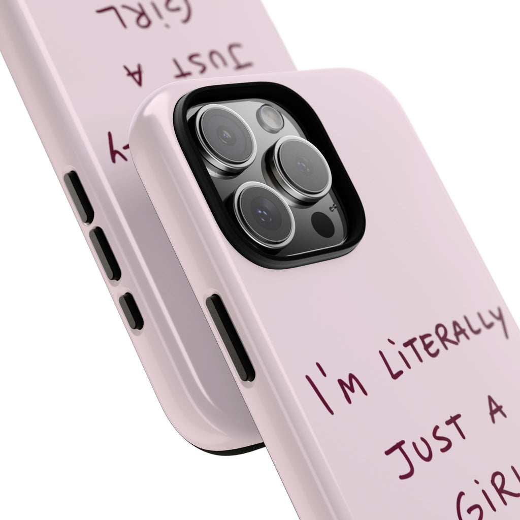 Close-up light pink phone case with side button cutouts and “I’m Literally Just a Girl”