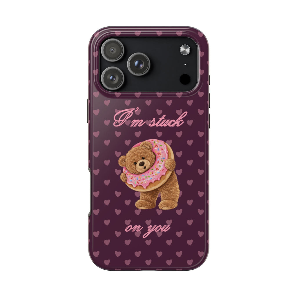 Purple teddy bear phone case with hearts, donut bear graphic, “I’m stuck on you” text